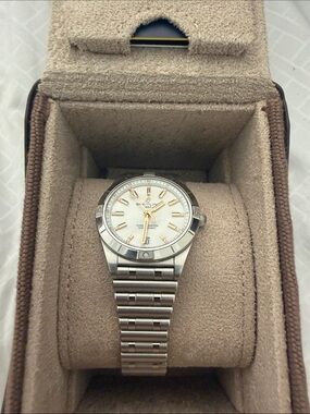 Breitling Silver Stainless Steel Watch with Gold Accents and White Dial automatc